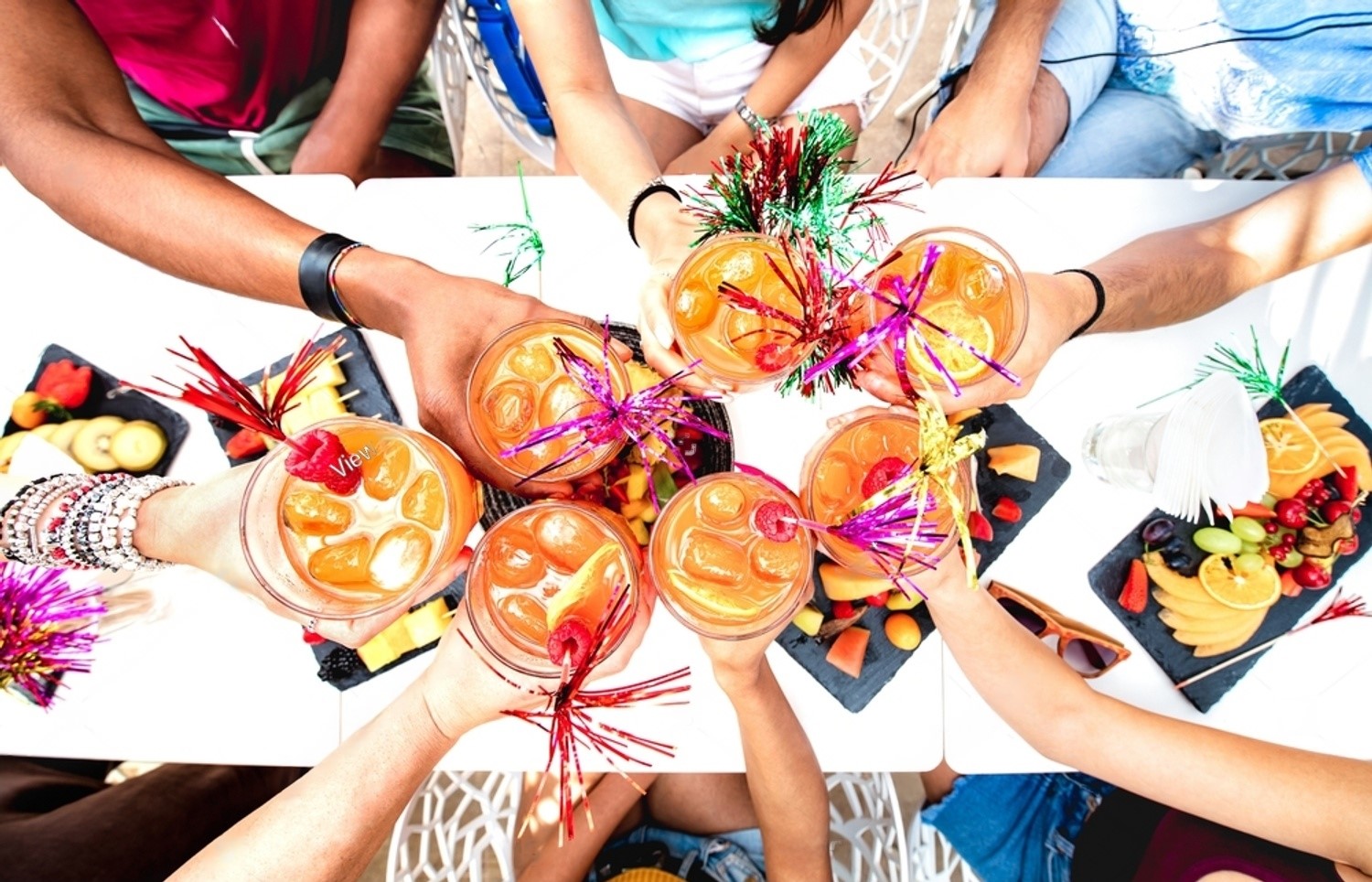 stock-photo-people-hands-drinking-sex-on-the-beach-cocktails-fancy-friends-having-fun-together-toasting-2278241963-transformed