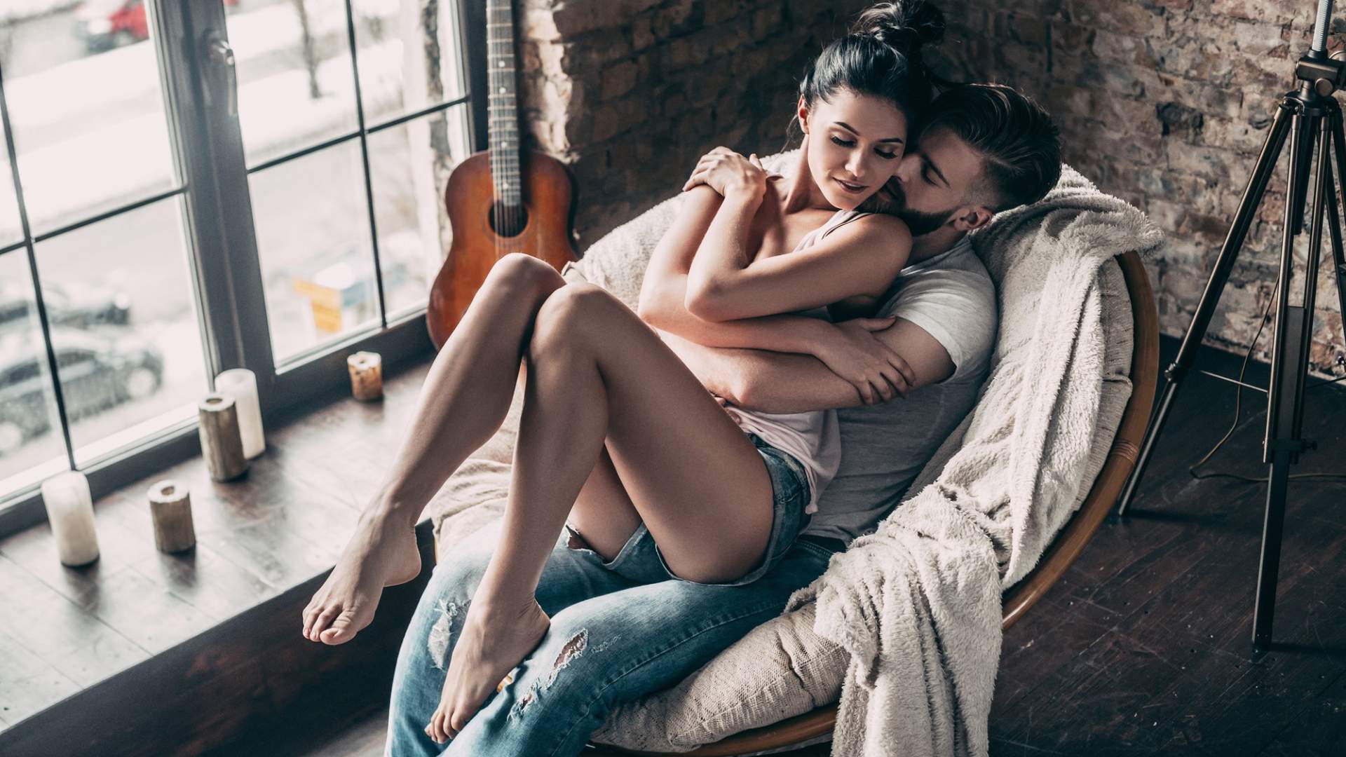 Couple relaxing together on an adults-only getaway featuring an Erotic Couples Retreat at Fantasy Retreat